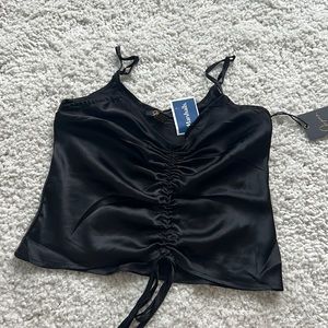Black satin cinch front top